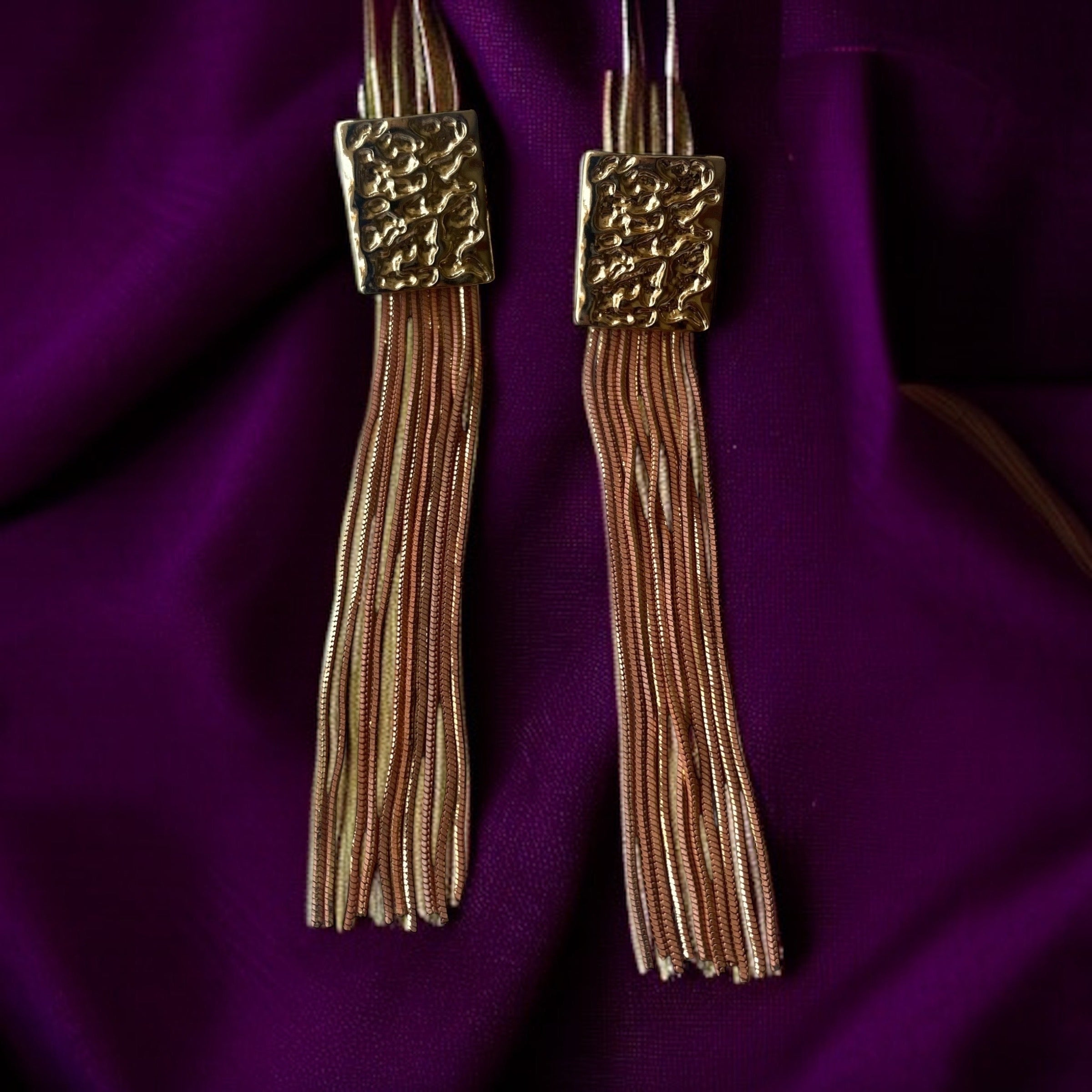 Saçaklı bronz küpe
